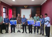 Sekda Pasangkayu Sampaikan Apresiasi kepada ASN Purna Tugas dalam Acara Ramah Tamah dan Penyerahan Pensiun